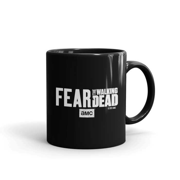 Close-up view of the large, easy-grip handle on the black mug