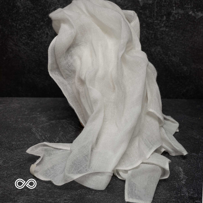 Ivory hemmed